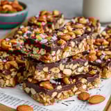 A plate of dark chocolate and sea salt nut bars.